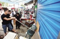 土狗發狂咬傷自己主人 民警兩槍將狗擊斃(圖)