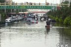 哈爾濱大雨 6月17日哈爾濱下大雨導(dǎo)致路面積水汽車被