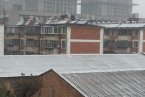 昆明迎來2014年第一場雪 長水機場遭殃