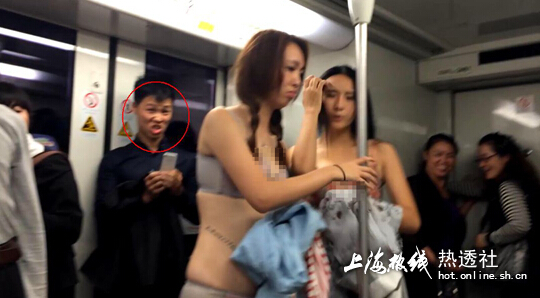 上海地鐵妙齡女當眾脫衣